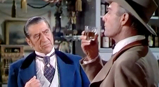 Robert Warwick as J.C. Crane, a businessman in Prescott, Ariz., who winds up backing Jackson 'Sugarfoot' Redan in Sugarfoot (1951)