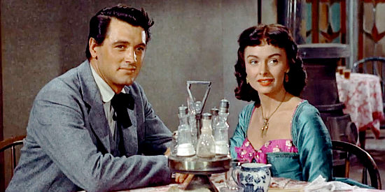 Rock Hudson as Ben Warren and Donna Reed as Jennifer Ballard, enjoying a happy reunion in Gun Fury (1953)