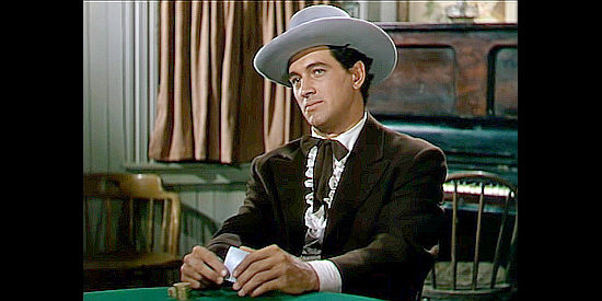Rock Hudson as Trey Wilson, the gambler McLyntock meets in Seattle in Bend of the River (1952)