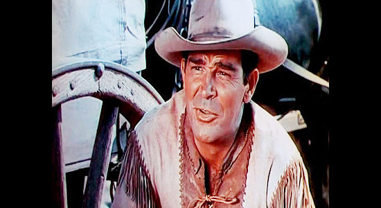 Rod Cameron as Jeff Curtis, wagon train guide hired to get settlers to California safely in Wagons West (1952)