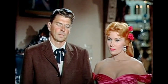 Ronald Reagan as Cowpoke with Rhonda Fleming as The Duchess in Tennessee's Partner (1955)