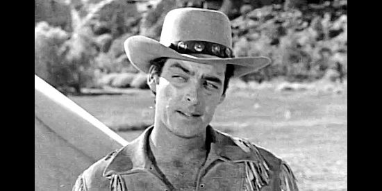 Rory Calhoun as Adam Reed, trying to warn of the danger posed by the Cheyenne in The Yellow Tomahawk (1952)
