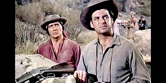 Rory Calhoun as Logan Cates and Frank DeCova as Lugo, hoping for a change in the weather that will make an attack less likely in Apache Territory (1958)