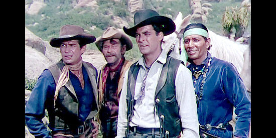 Rory Calhoun as Ray Cully realizes Indians are trailing George Bhumer and his pretty daughter in Four Guns to the Border (1954)