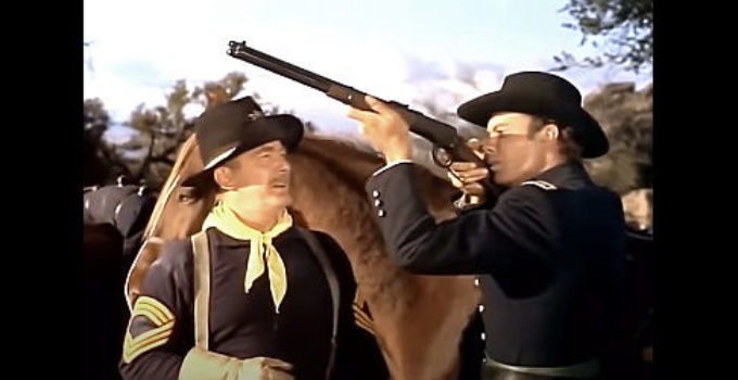 Roy Roberts as Sgt. Creever, teaching Dr. Allen Seward (Robert Francis) how to use a rifle in They Rode West (1954)