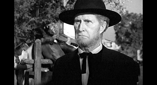 Russell SImpson as Adam Perkins, one of the leaders of the Mormon wagon train in Wagon Master (1950)