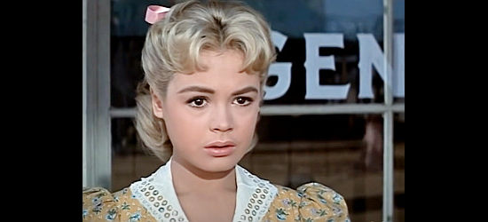 Sandra Dee as Rosalie Stocker, on the verge of becoming a store owner's helper in The Wild and the Innocent (1959)