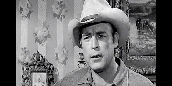 Scott Brady as Bart Jones, the gunman who rides into town and decides to help the small ranchers in The Storm Rider (1957)