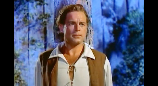 Scott Brady as Jonathan Adams, strapped to a tree and facing execution by the Indians in Mohawk (1956)