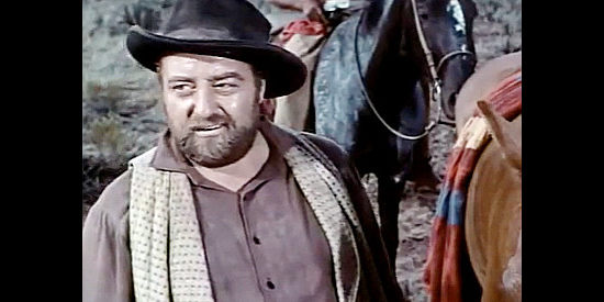 Sebastian Cabot as Jonah, the man caught smuggling rifles to the Indians in Dragoon Wells Massacre (1957)