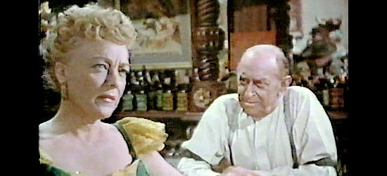 Sheila Bromley as Marie, yearning for a return of the wild days, until Jagade's influence starts to take hold in A Day of Fury (1956)