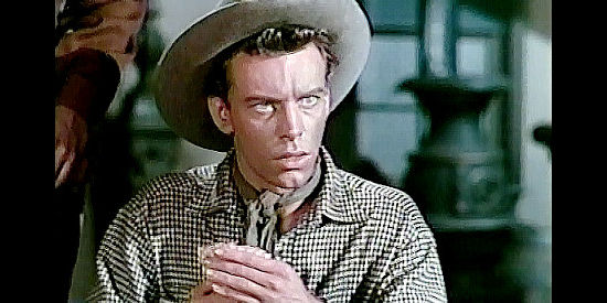 Skip Homeier as Cass Downing, who enters into a deal with the Morans to keep his ranch out of debt in The Lone Gun (1954)
