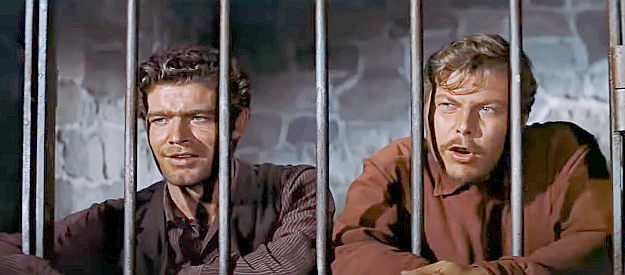 Stephen Boyd as Bill Zachary and Albert Salmi as Ed Taylor, in jail and awaiting their hanging in The Bravados (1958)