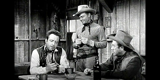 Steve Brodie as Dunsten and Don 'Red' Barry as Larry plan their next robbery in Gun Duel in Durango (1957)