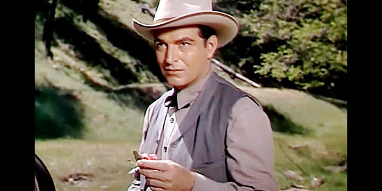 Steve McNally as Steve Davis, sent undercover to find out who's behind mail holdups in Wyoming Mail (1950)