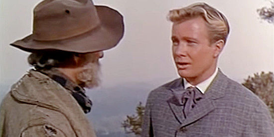 Steven Terrell as Billy, Tracy Powell's son, begging his dad to come home for a while in The Naked Hills (1956)