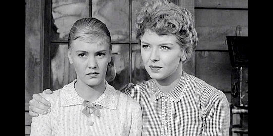 Sue George as Marigold Dalton, being consoled by sister Holly (Merry Anders) in The Dalton Girls (1957)