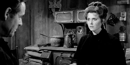 Tina Louise as Helen Crane, asking her former lover to spare her husband's life in Day of the Outlaw (1959)