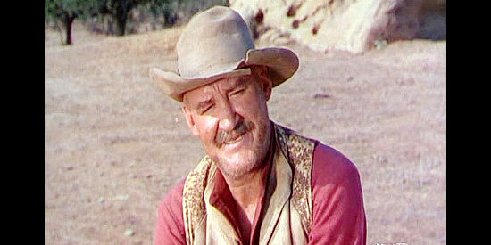 Tom Tully as Crowshaw, the cavalry scout who knows Bart Laish's secret in Arrow in the Dust (1954)