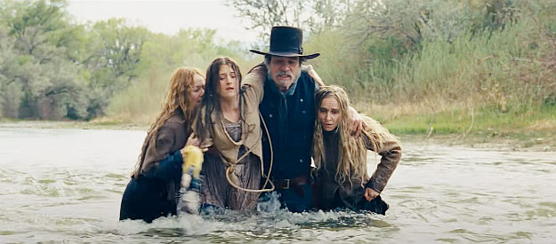 Tommy Lee Jones as George Briggs, rescuing the three women from the river in The Homesman (2014)