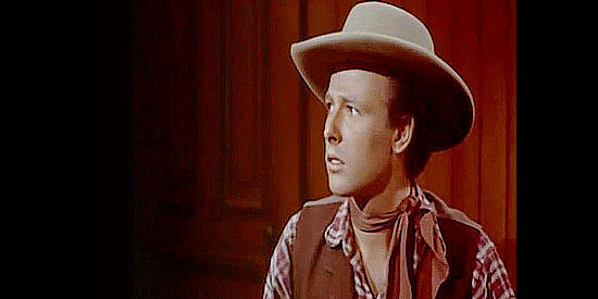 Tyler MacDuff, a young cowboy convinced Jim Kipp is after him in The Bounty Hunter (1954)