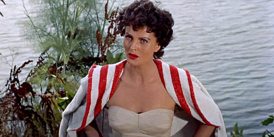 Ursula Thiess as Marianna, the lady ranch owner at odds with Hermany in The Americano (1955)