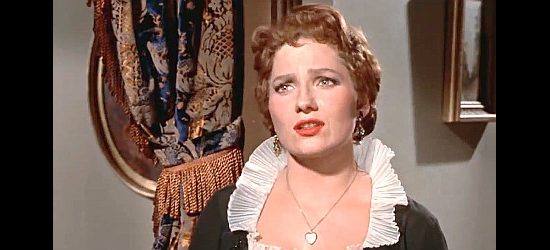 Valerie French as Ruby James, the woman who loves Tate Kimbrough and is convinced he still needs her in Decision at Sundown (1957)