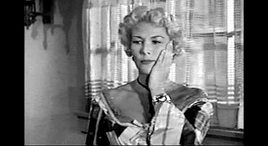 Veda Ann Borg as Whitey, a saloon owner in love with Quentin Allen and feeling the sting of his hand in Bitter Creek (1954)