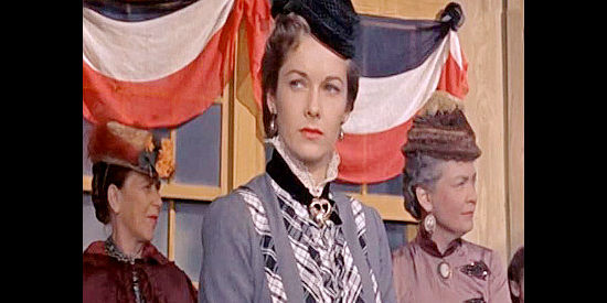 Vera Miles as Laurie McCoy, daughter of a town leader who Wyatt Earp falls for in Wichita (1955)
