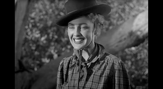 Virginia Grey as Mary Smith, the woman who stumbles upon Ford Smith's camp and becomes his traveling companion in Desert Pursuit (1952)