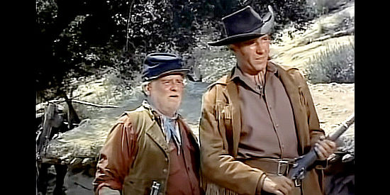 Wallace Ford as Mac McBride and Phil Carey as Wayne Harper, trying to figure out how to stay alive in The Nebraskan (1953)