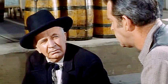 Walter Brennan as Doc Lacy, the one Plainview resident who stands by Jack Wright (Fred MacMurray) in At Gunpoint (1955)