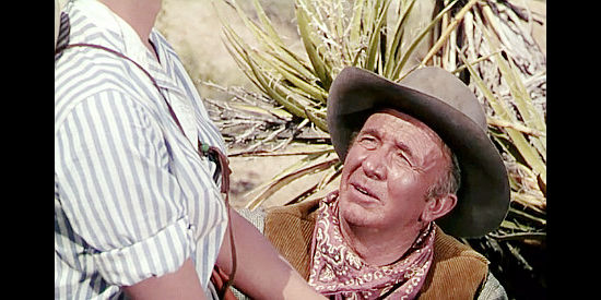 Walter Brennan as George Bhumer, trying to talk sense into his daughter Lolly in Four Guns to the Border (1954)