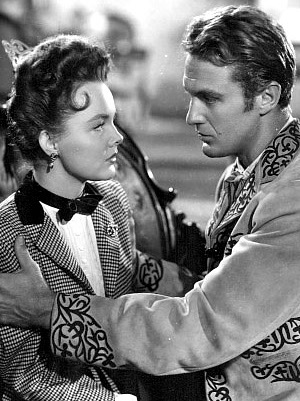 Wanda Hendrix as Carmel Alvarado and Robert Stack as Patrick O'Moore in My Outlaw Brother (1951)