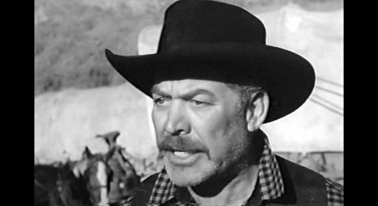 Ward Bond as Elder Wiggs, the leader of the Mormon Wagon train heading West in Wagon Master (1950)