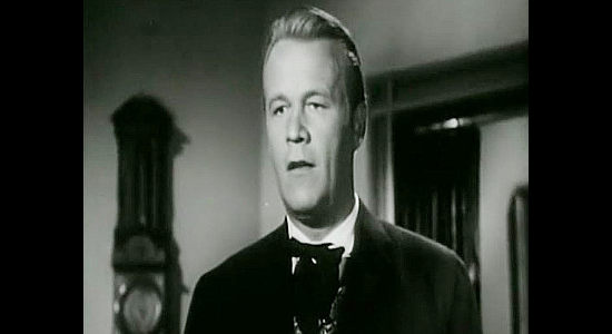 Wayne Morris as Marshal Harding, the man elevated to that position by Artemus Taylor and expected to follow his wishes in The Bushwhackers (1952)