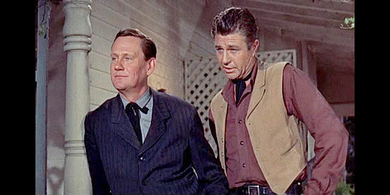 Wendell Corey as Jesse James and JIm Davis as his brother Frank, wondering what to make of Milford Farnsworth in Alias Jesse James (1959)