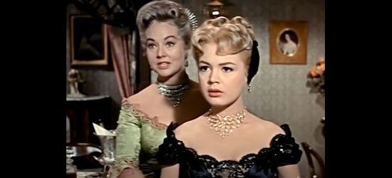 Wesley Marie Tackitt as Ma Ransome, preparing Rosalie for her first night as a dance hall girl in The Wild and the Innocent (1959)
