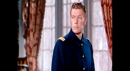 Willard Parker as Capt. Kirby, the regular Army officer working in cahoots with Roger Hale in The Vanquished (1953)