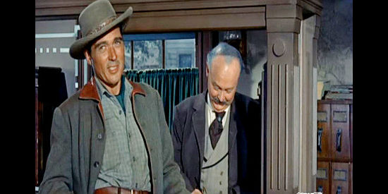 William Bishop as Sundance, checking out the Broken Bow bank in preparation for a robbery in Wyoming Renegades (1955)