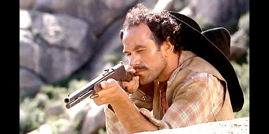 Aldo Sambrell as Juan Guardo, preparing an ambush for Gringo in Gunfight at Red Sands (1963)