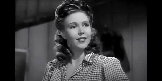 Ann Miller as Lola, the saloon girl at odds with Belinda Pendergast again in Go West Young Lady (1941)