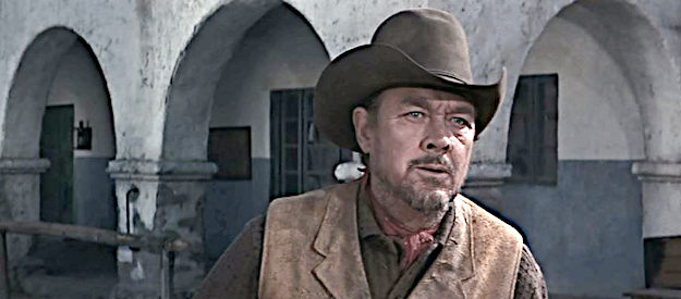 Ben Johnson as James Pepper, rushing to the assistance of John Chisum in Chisum (1970)