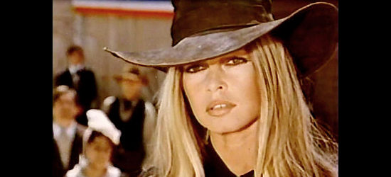 Brigitte Bardot as Louise, hoping her plan for the Sarrazin boys works in The Legend of Frenchie King (1971)