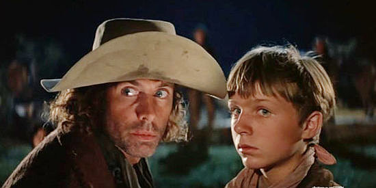 Bruce Dern as Asa Watts with Dan (Nicolas Beauvy, a young cowboy he's frightened in The Cowboys (1972)