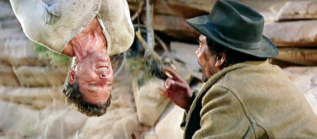 Burt Lancaster as Dolworth, in the hands of Mexican bandits in The Professionals (1966)