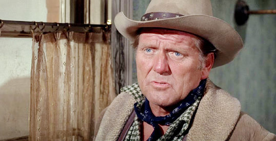 Charles McGraw as Sheriff Ray Calhoun, presented with the warrants in Hang 'Em High (1969)