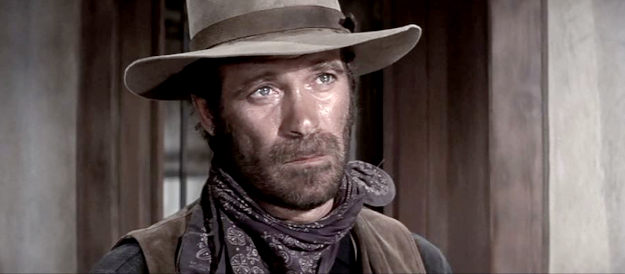 Christopher George as Noonan, a bounty man with an old score to settle with Billy in Chisum (1970)