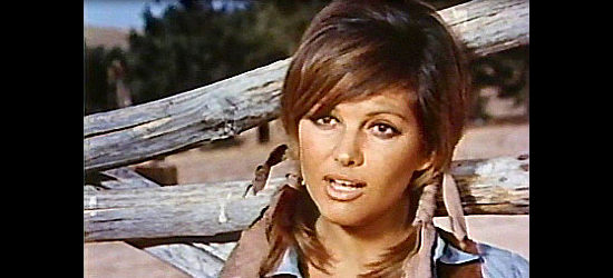 Claudia Cardinale as Maria, planning to put Louise on a wild horse in The Legend of Frenchie King (1971)