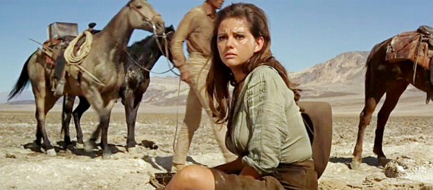 Claudia Cardinale as Maria, watching as her prized horse is put out of its misery in The Professionals (1966)